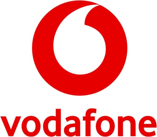 Vodafone-logo met een rood cirkelvormig pictogram boven het woord "vodafone" in kleine rode letters op een witte achtergrond.