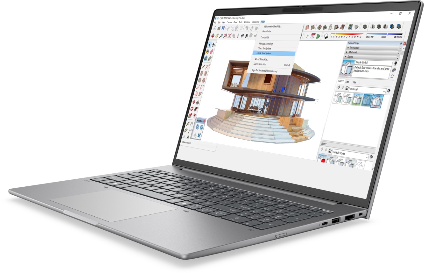 Een zilveren laptop van Hewlett Packard toont een 3D architectuurmodel en ontwerpsoftware-interface op het scherm.